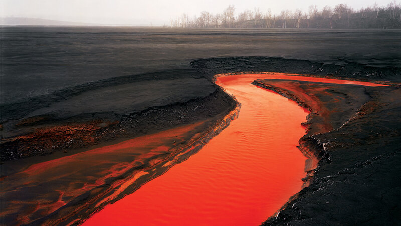 Lava river on dark landscape