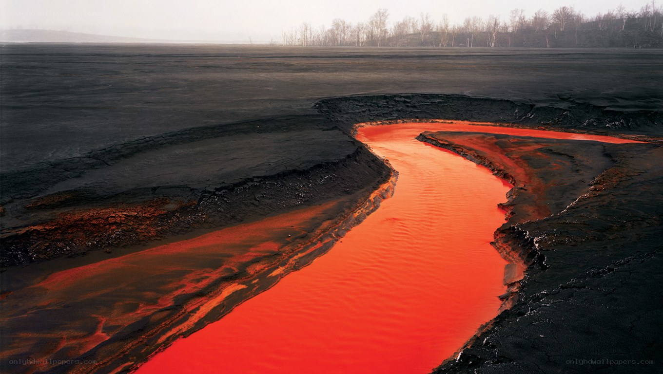 Lava river on dark landscape