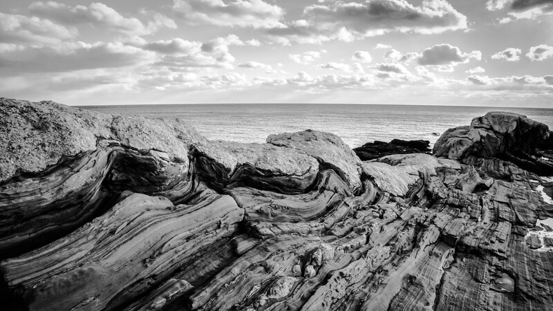 Layered Coastal Rocks — Black