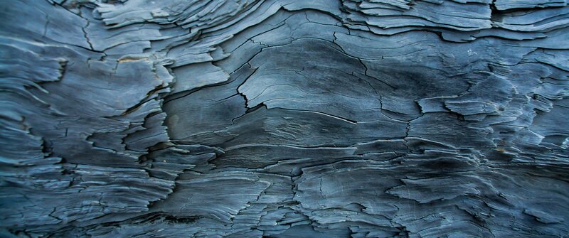 Layered Dark Rock Surface