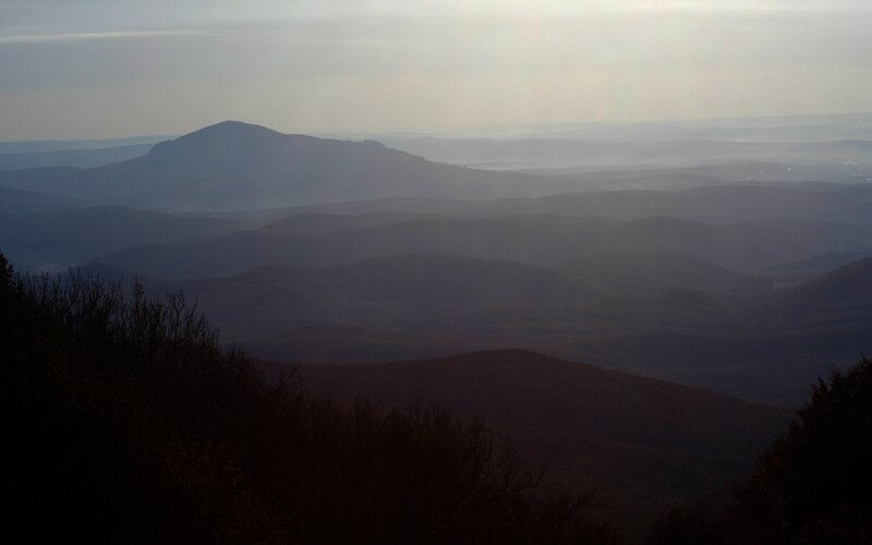 Layered mountain ranges at dusk