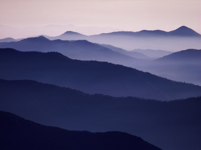 Layered mountains at dawn
