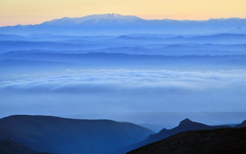 Layered mountains at dawn