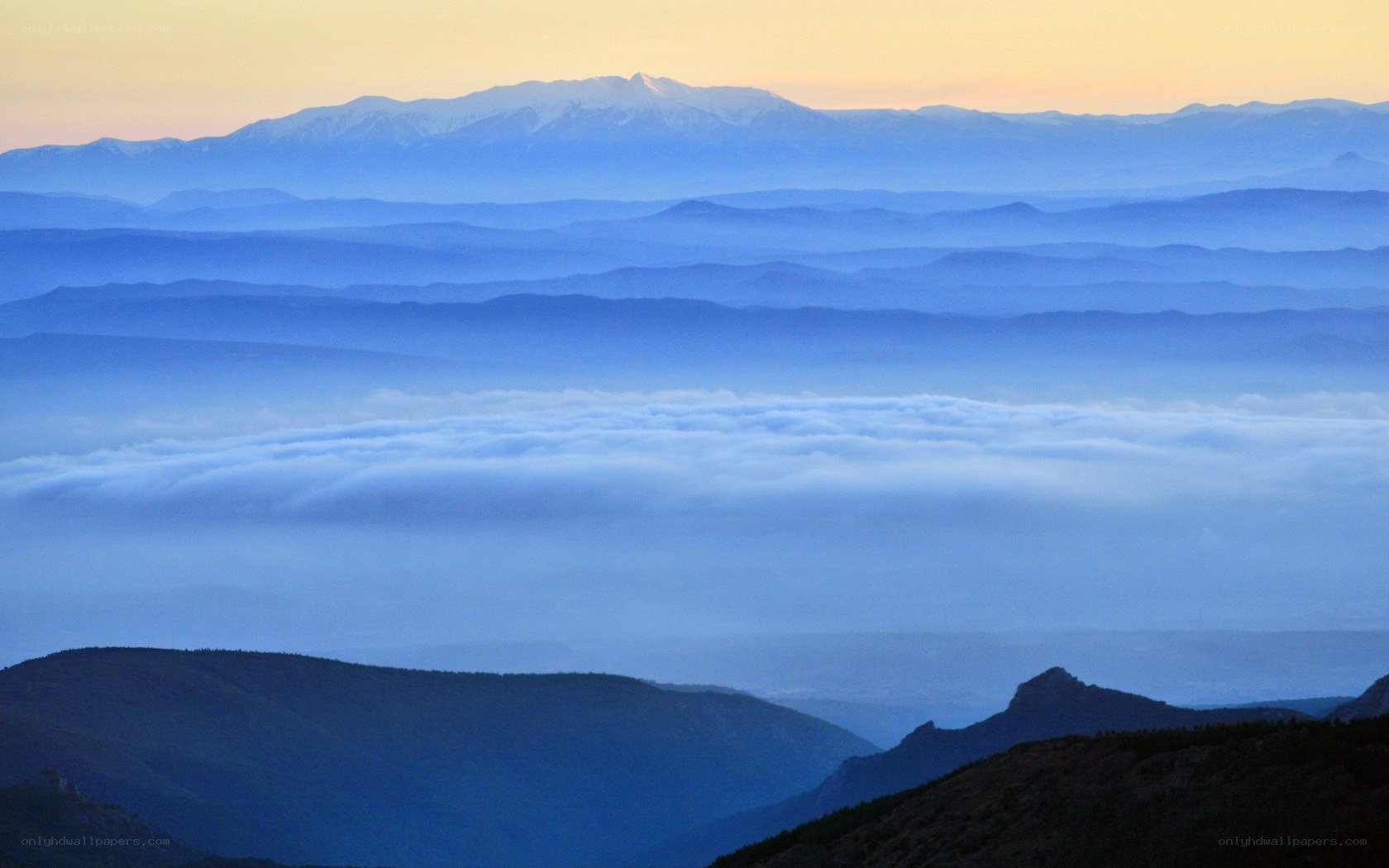 Layered mountains at dawn