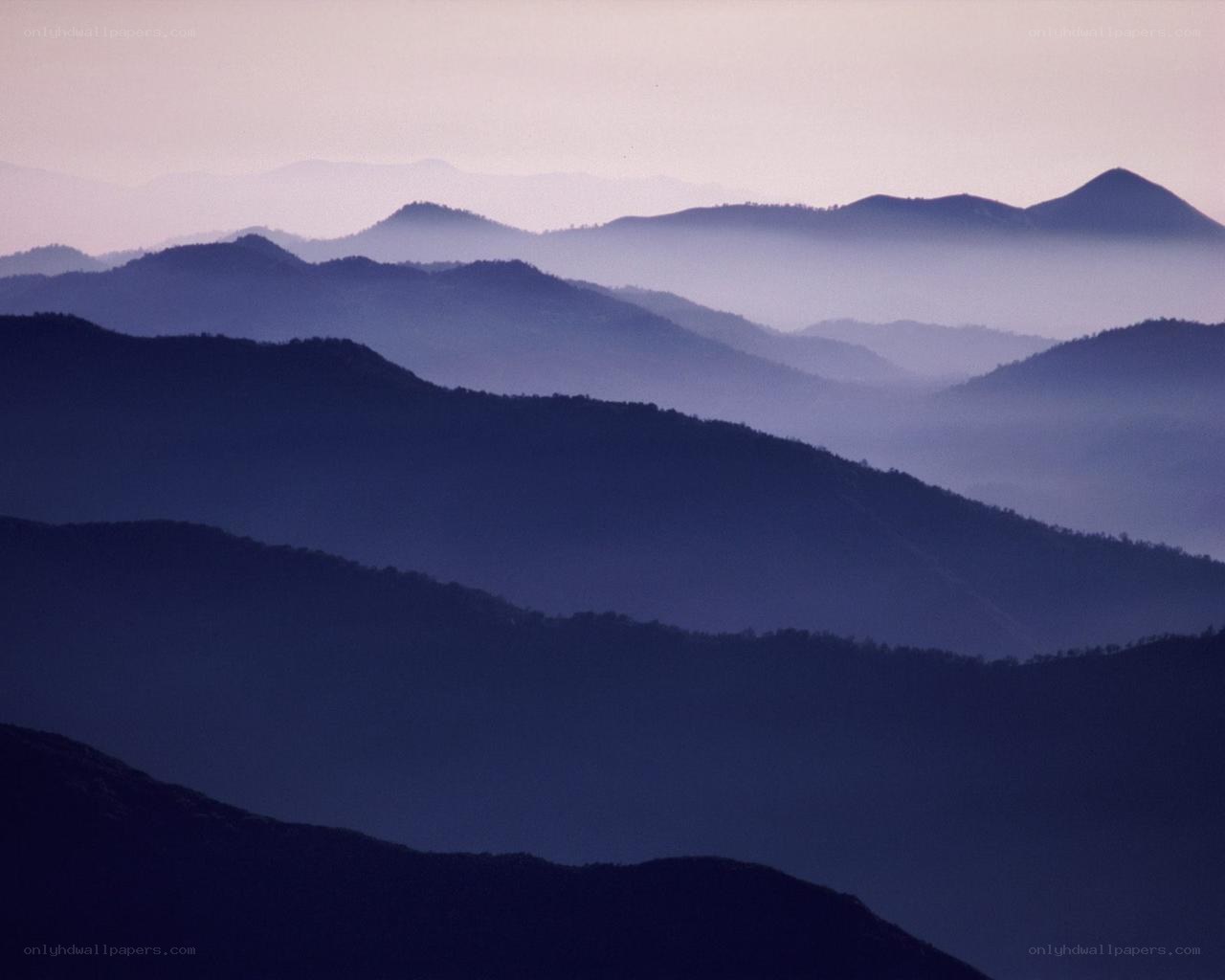 Layered mountains at dawn