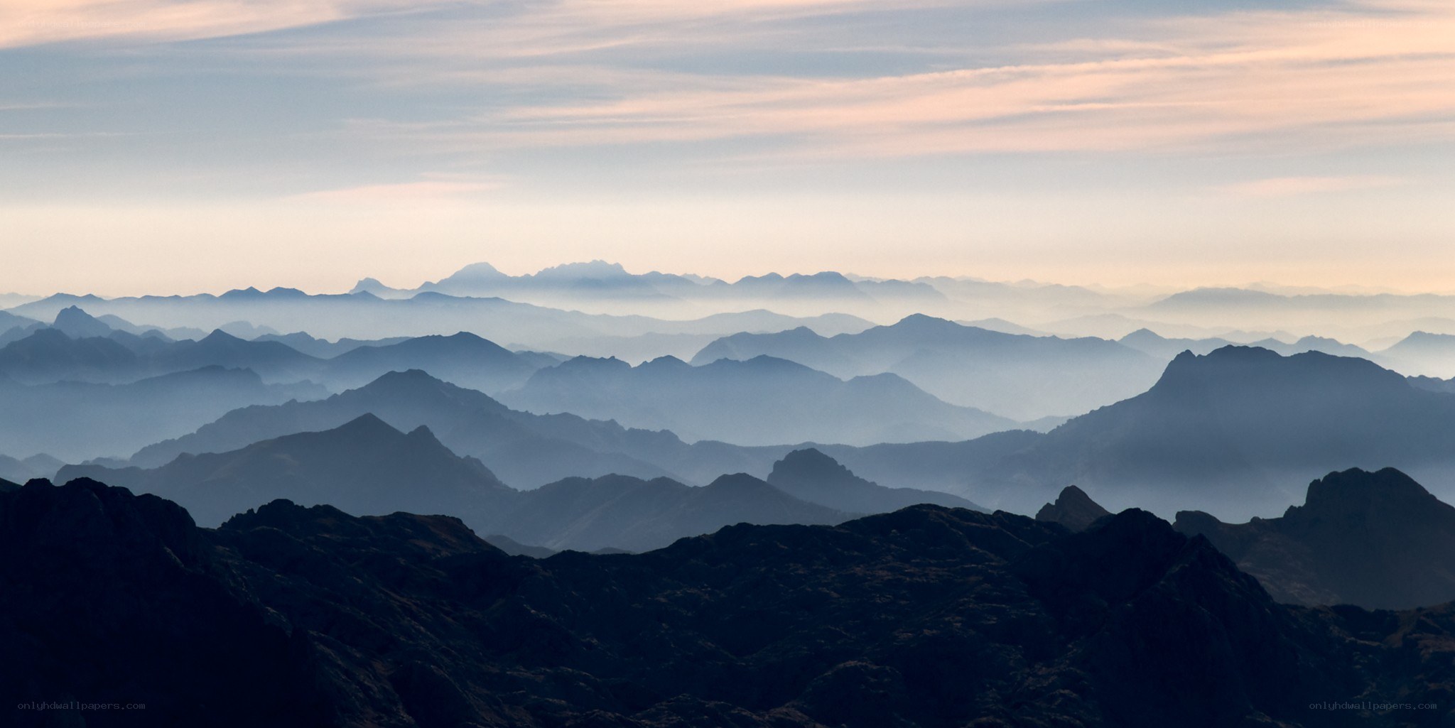 Layered mountains at dawn