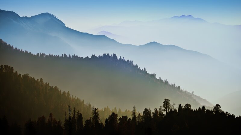 Layered Mountains at Dawn — Blue