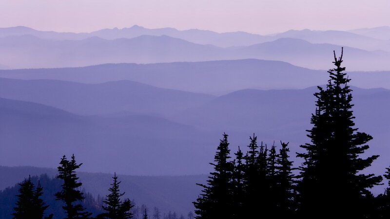 Layered mountains at dusk