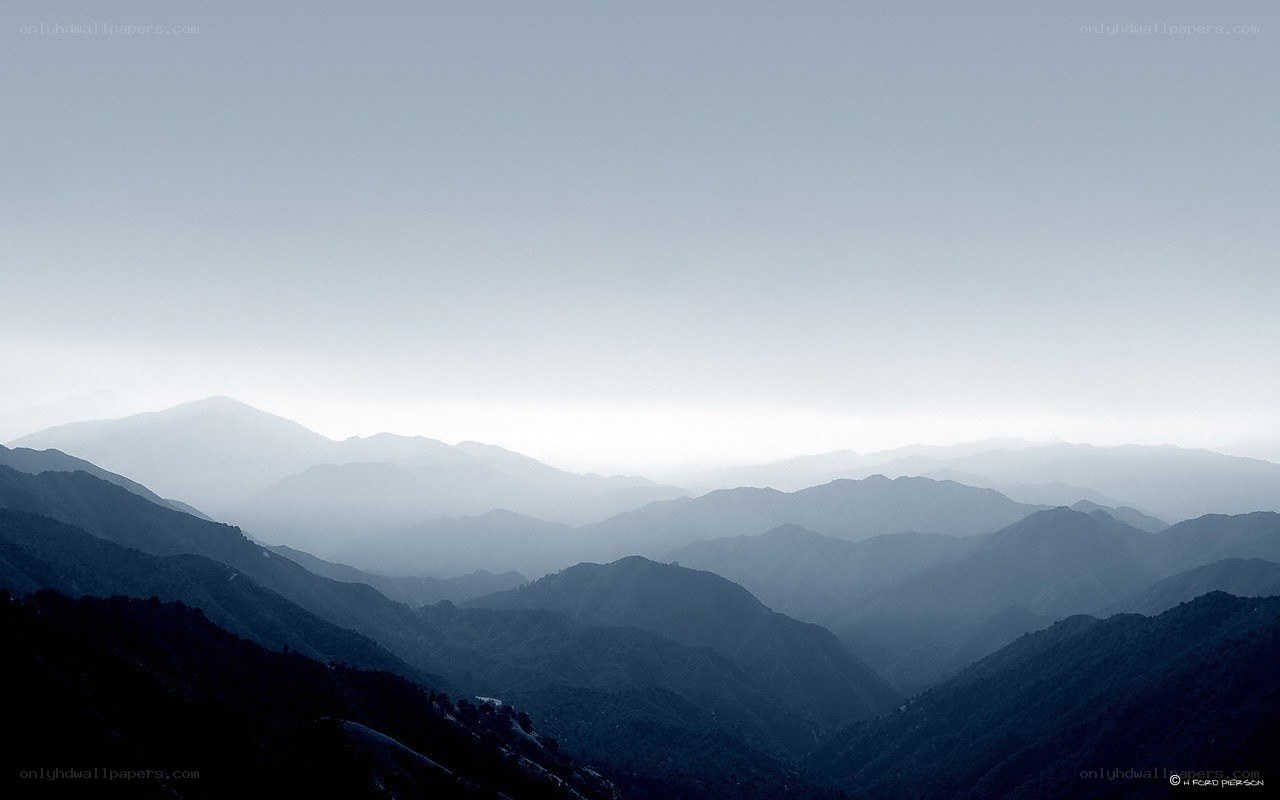 Layered Mountains in Haze