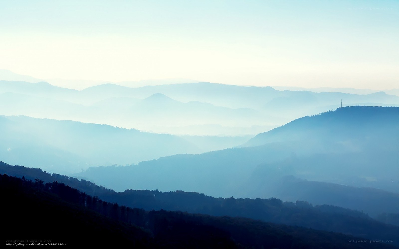Layered Mountains in Haze
