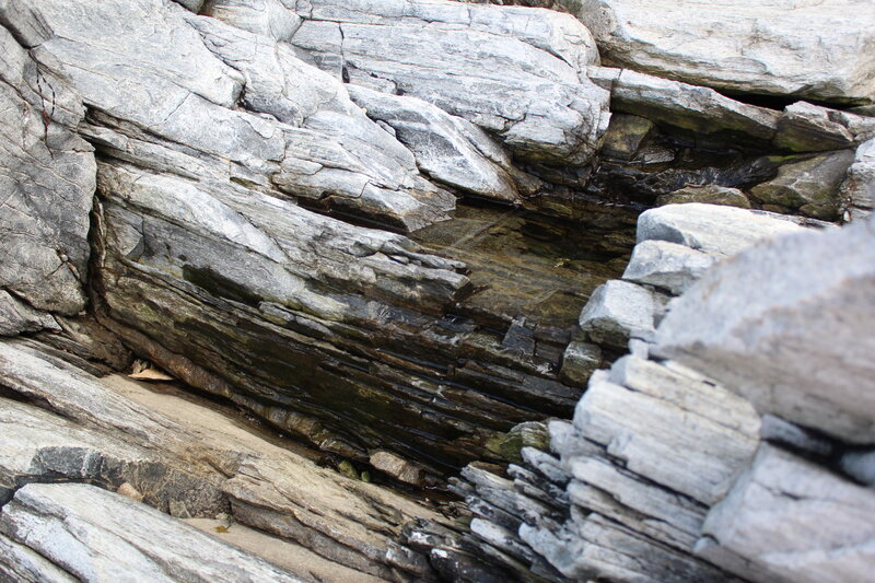 Layered Rock Formation — Gray
