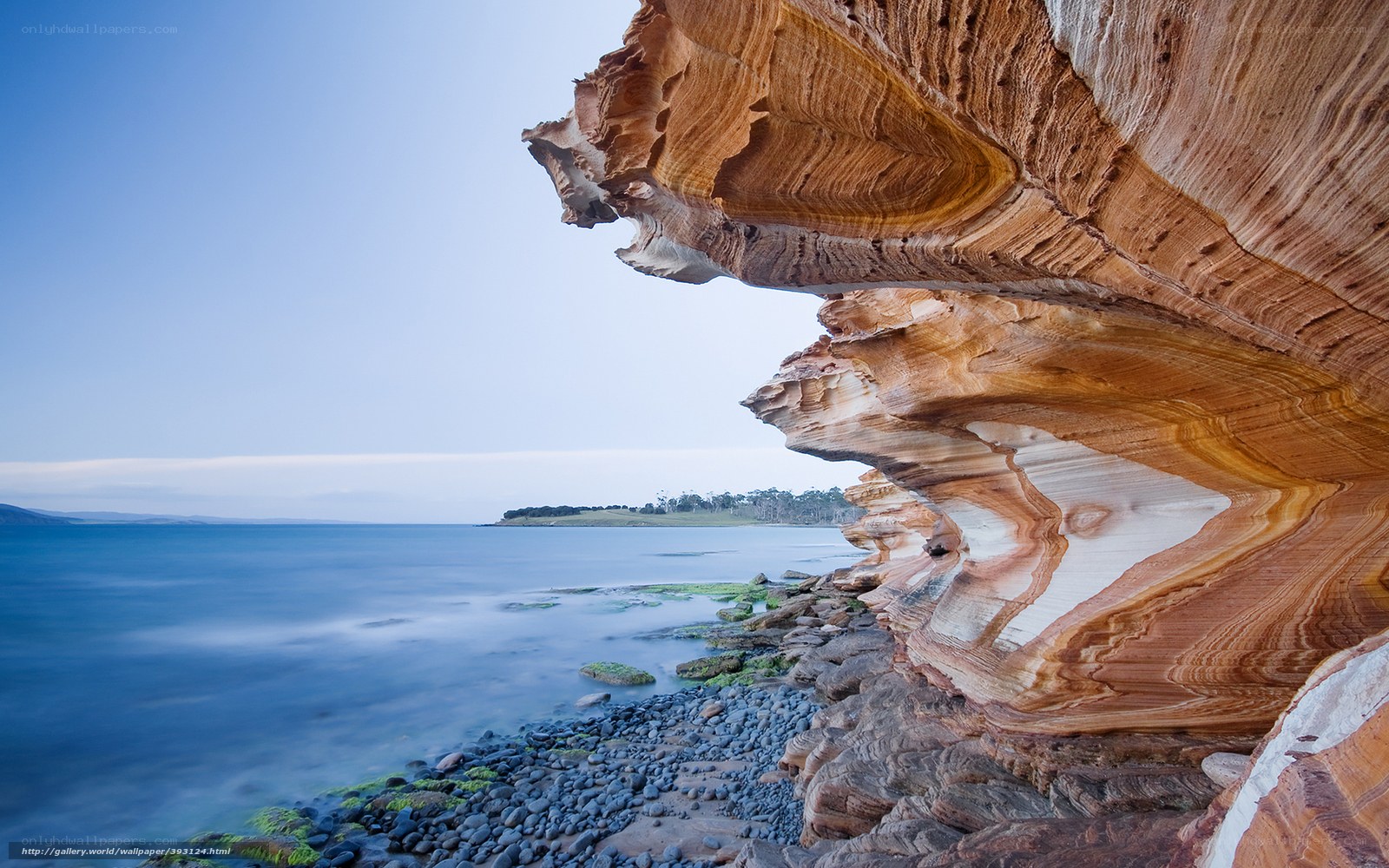 Layered rock formations at coast