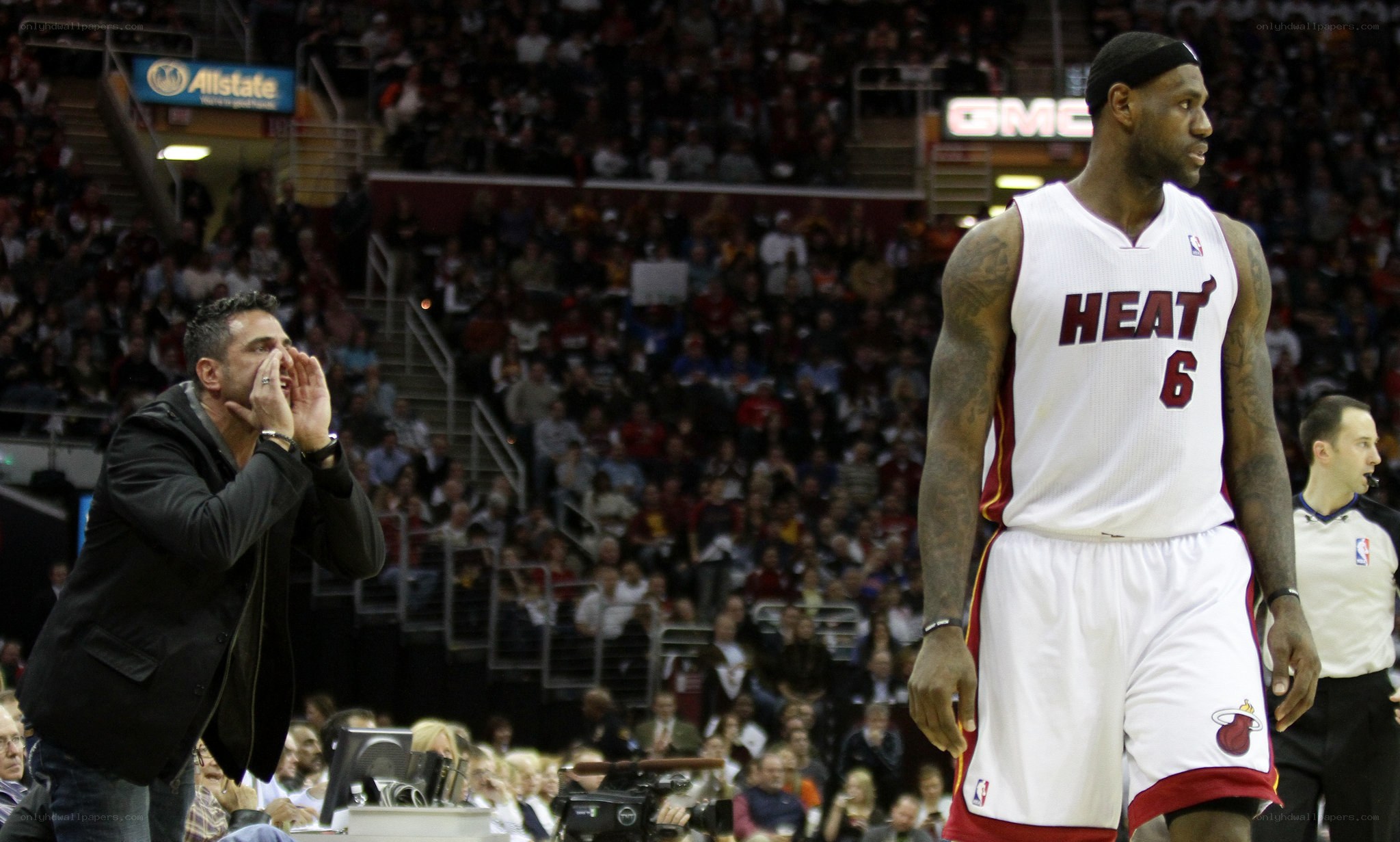 LeBron James and coach during game