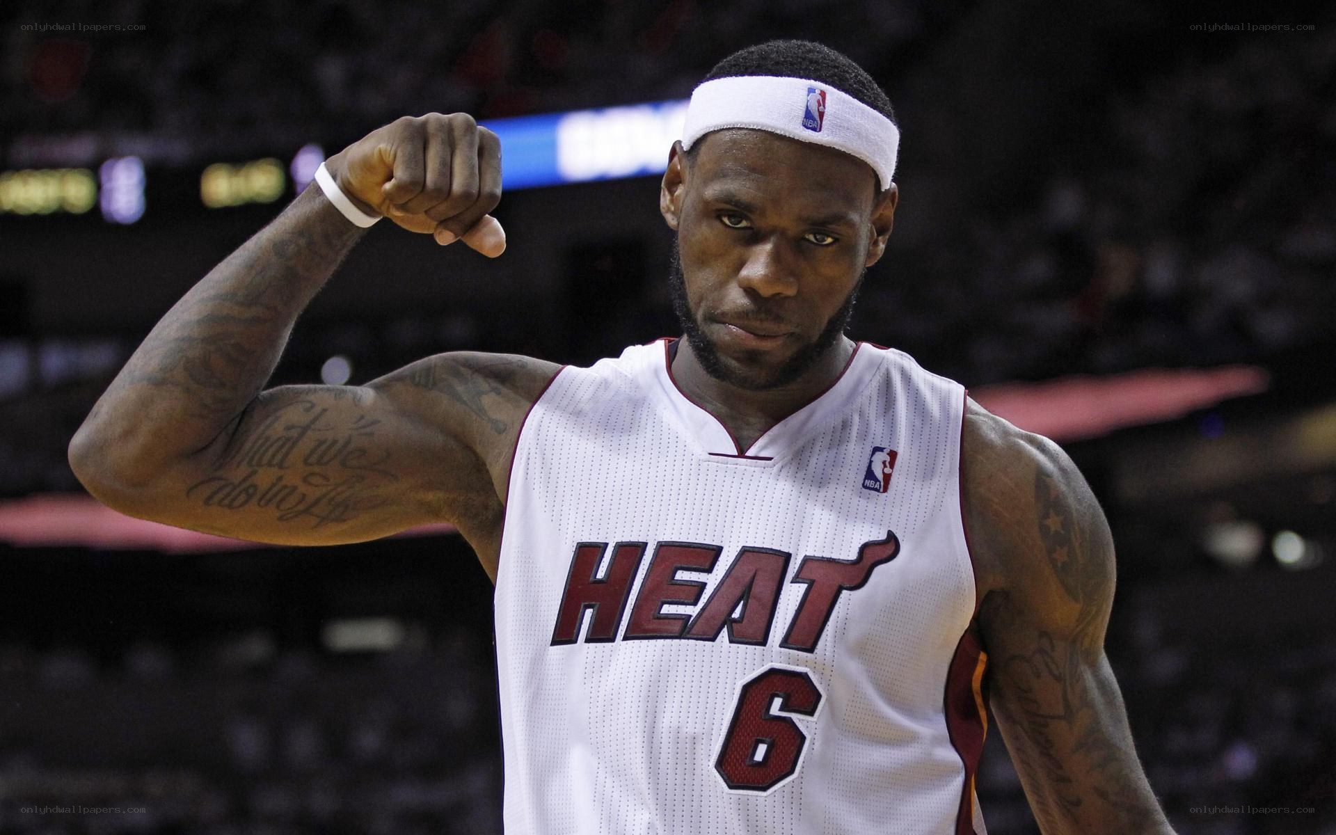LeBron James flexing in Miami Heat jersey
