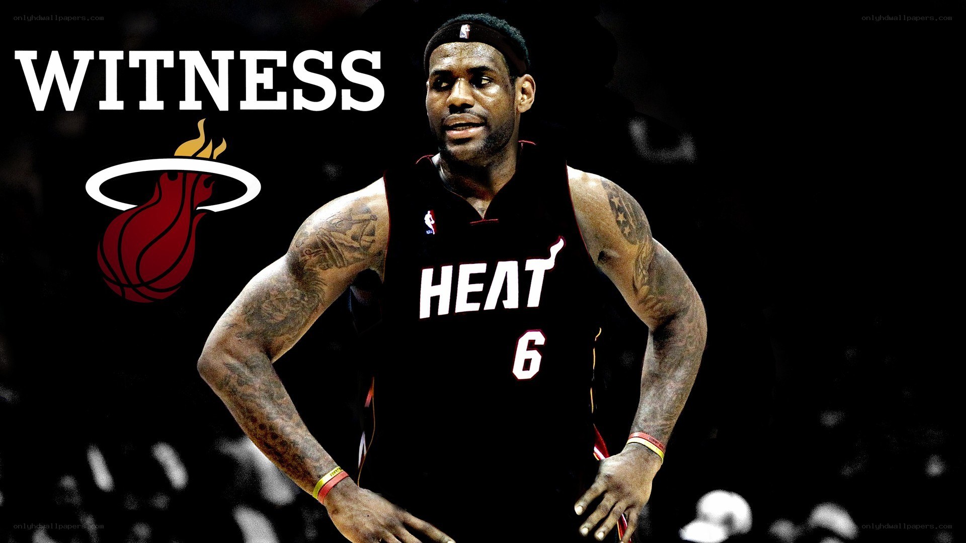 LeBron James with Heat logo