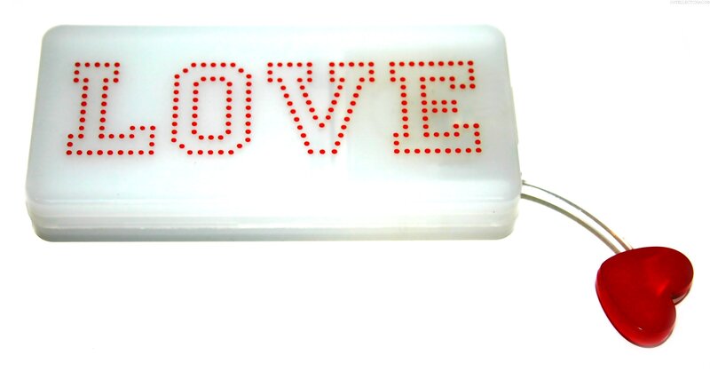 LED light with 'LOVE' and heart charm