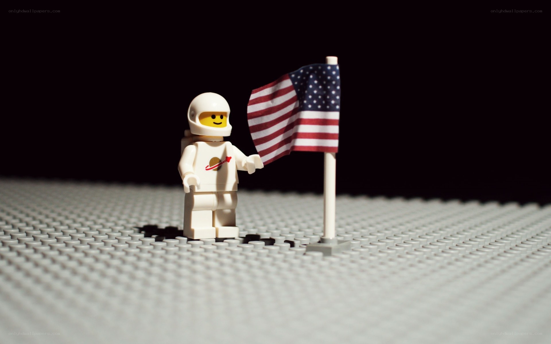 Lego astronaut with flag