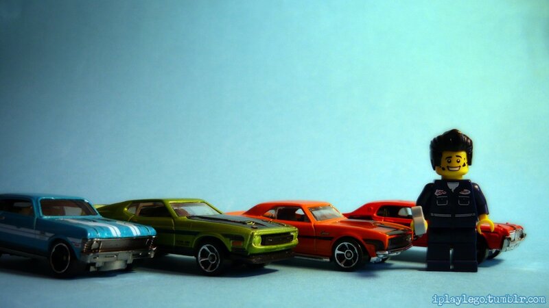 Lego figure with toy cars