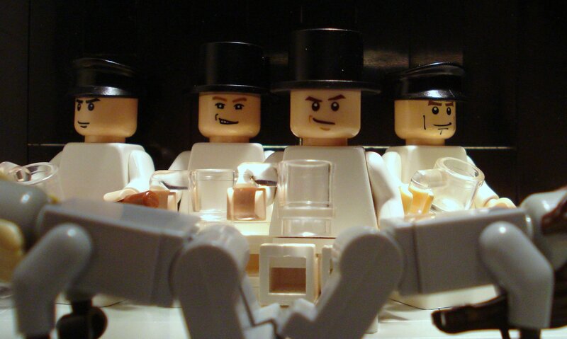 Lego figures at a table