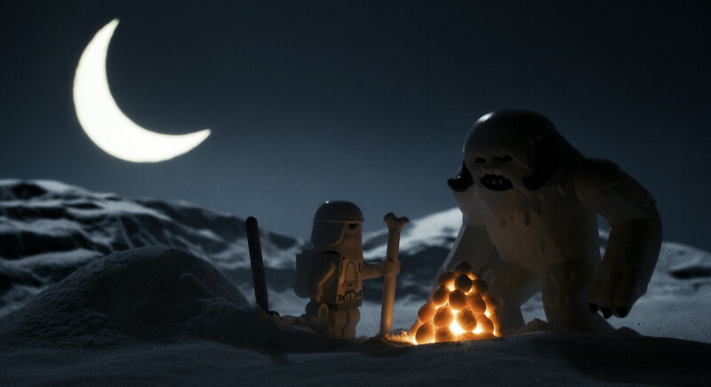 Lego figures by a campfire