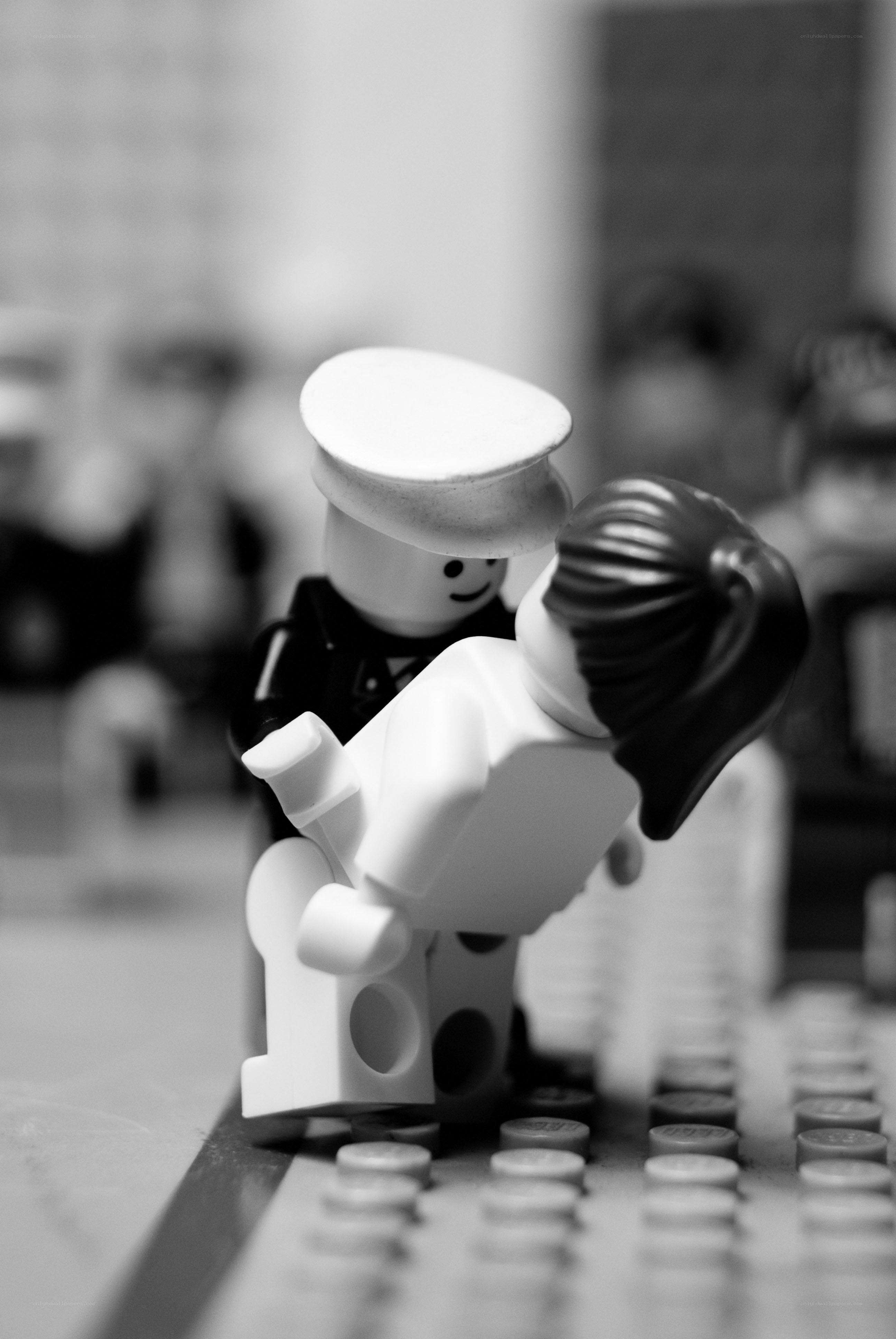 Lego figures in embrace