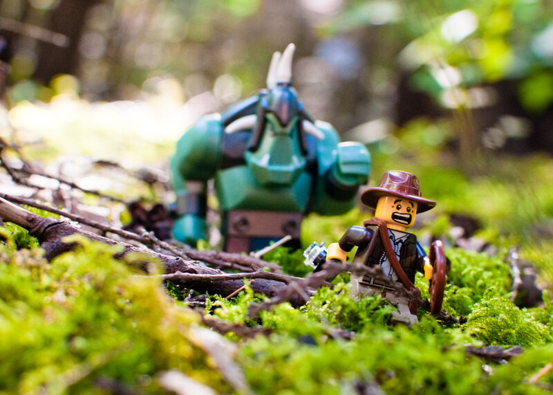 Lego figures in forest scene