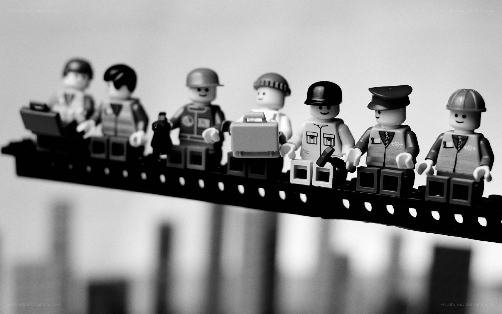 Lego figures on a beam