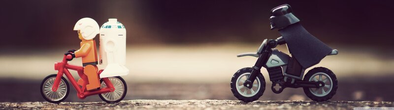 Lego Figures on Bikes — Red, Playful
