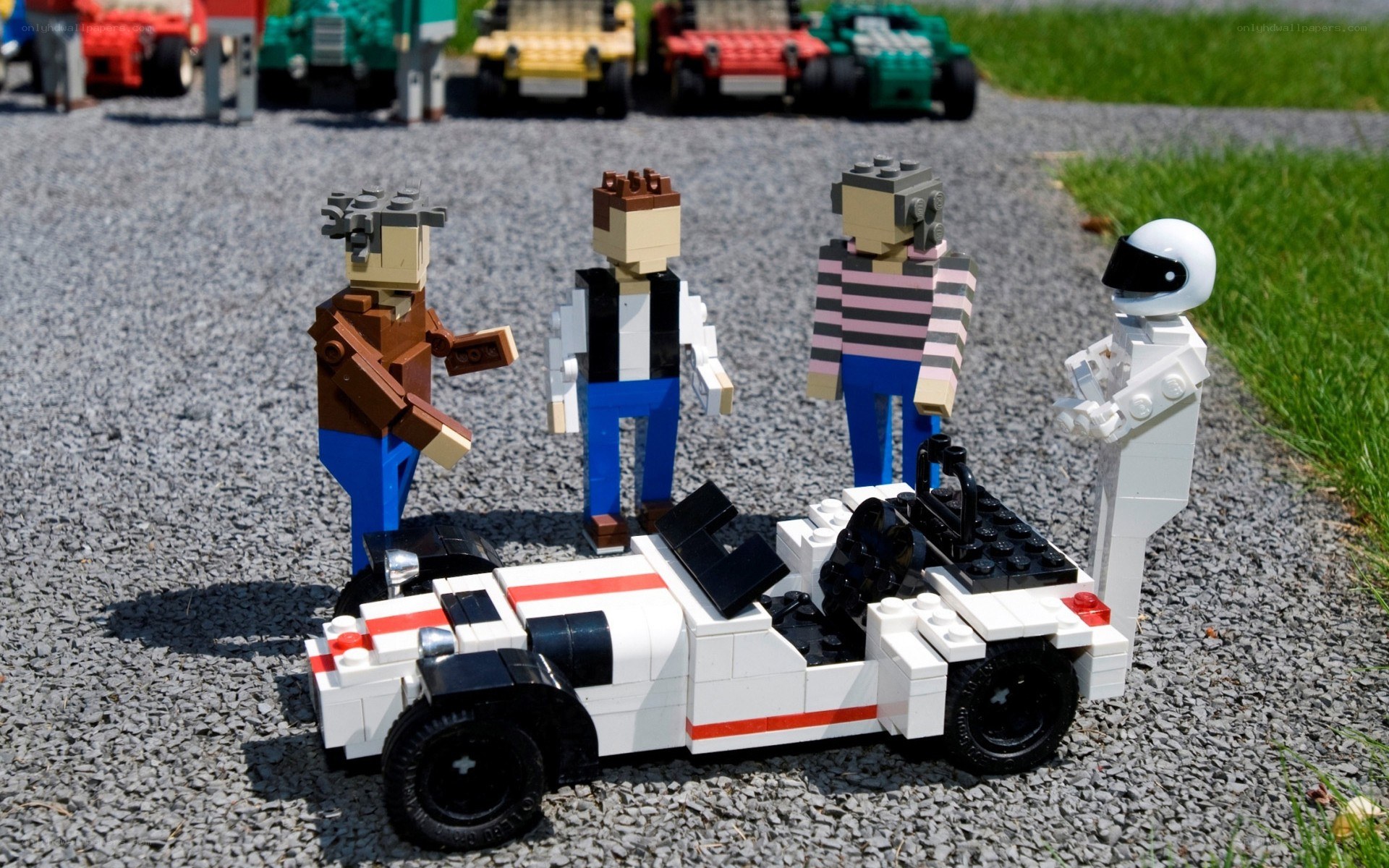Lego figures with race car