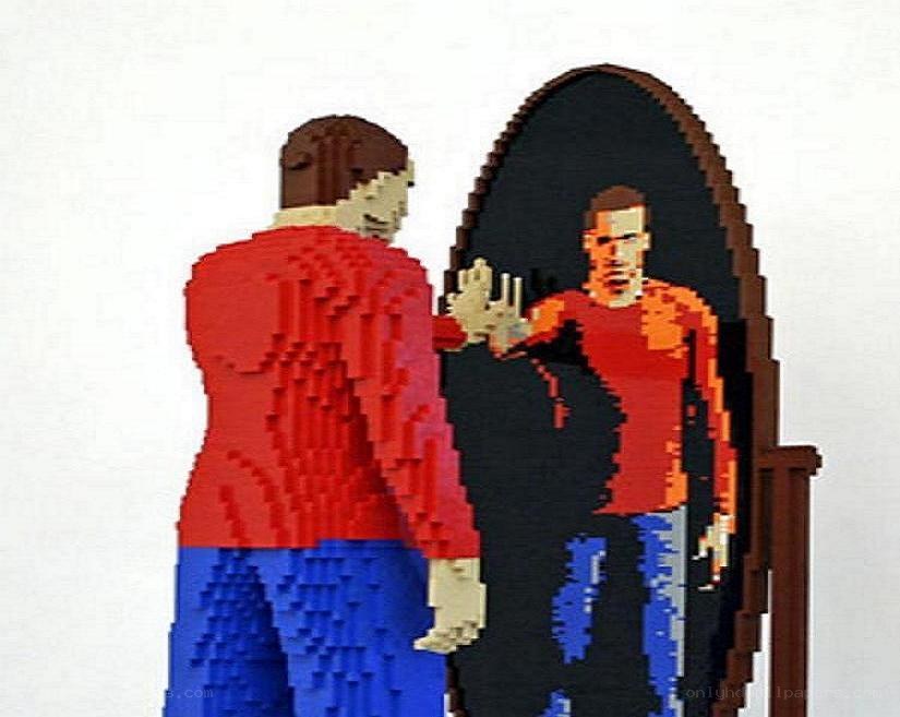 Lego man looking in mirror