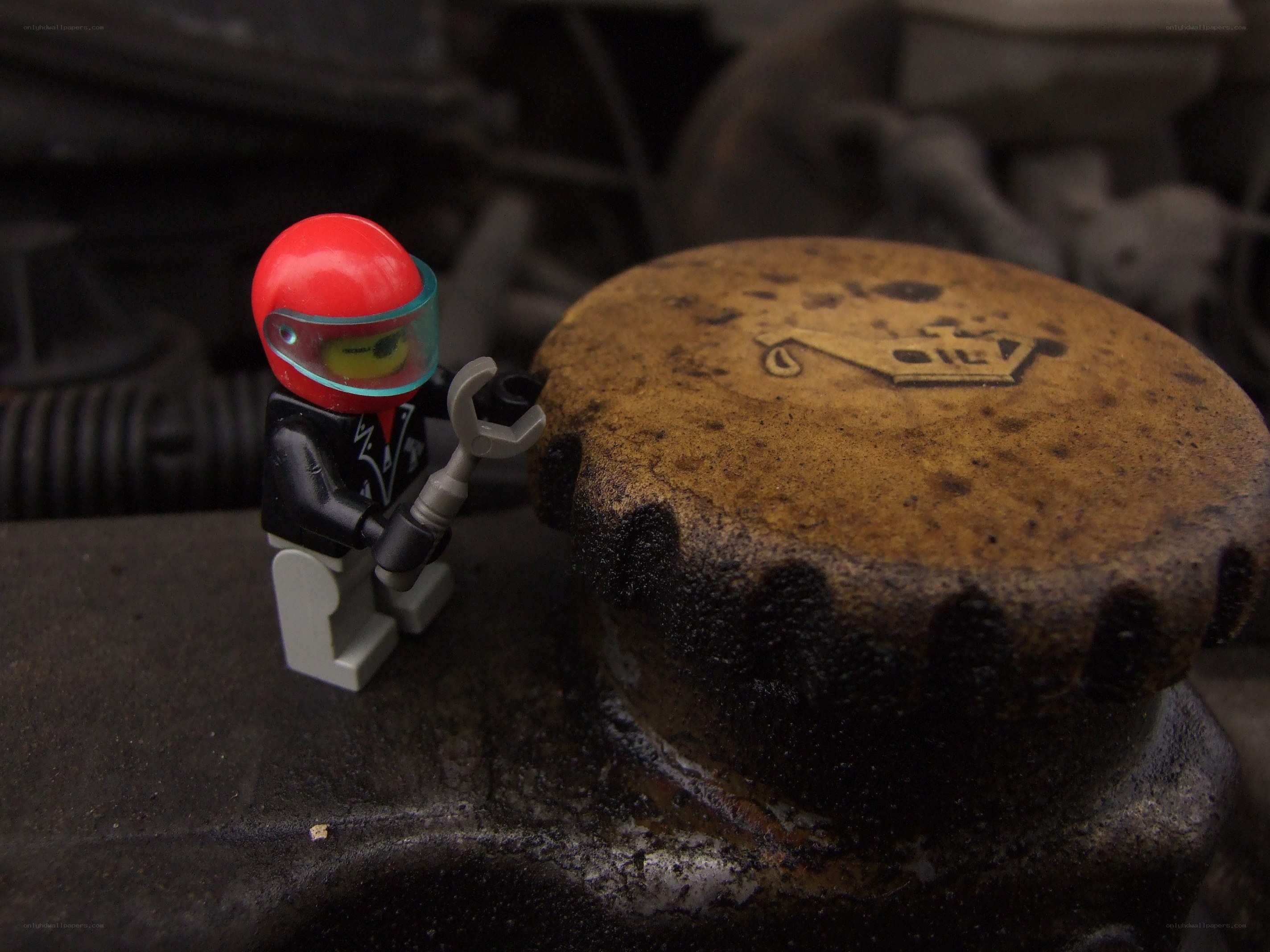 Lego mechanic at engine