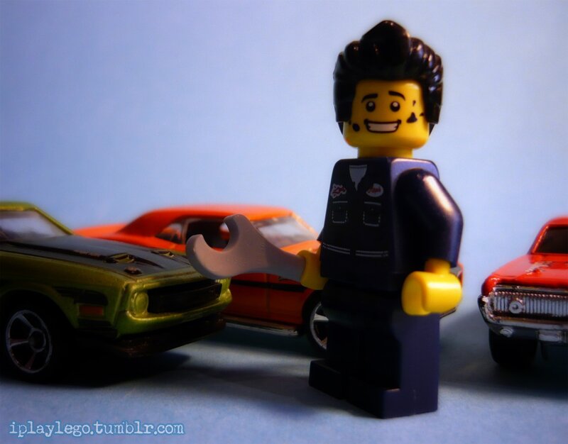 Lego mechanic with toy cars