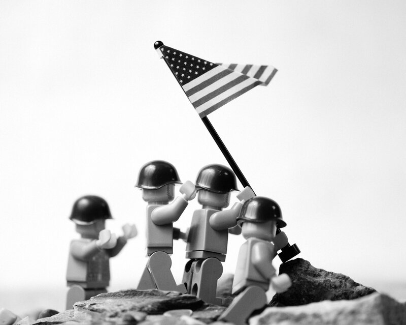 Lego soldiers raising flag
