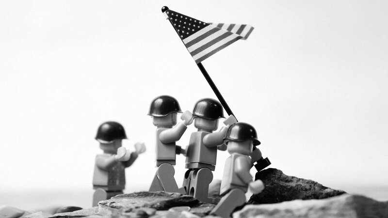 Lego soldiers raising flag