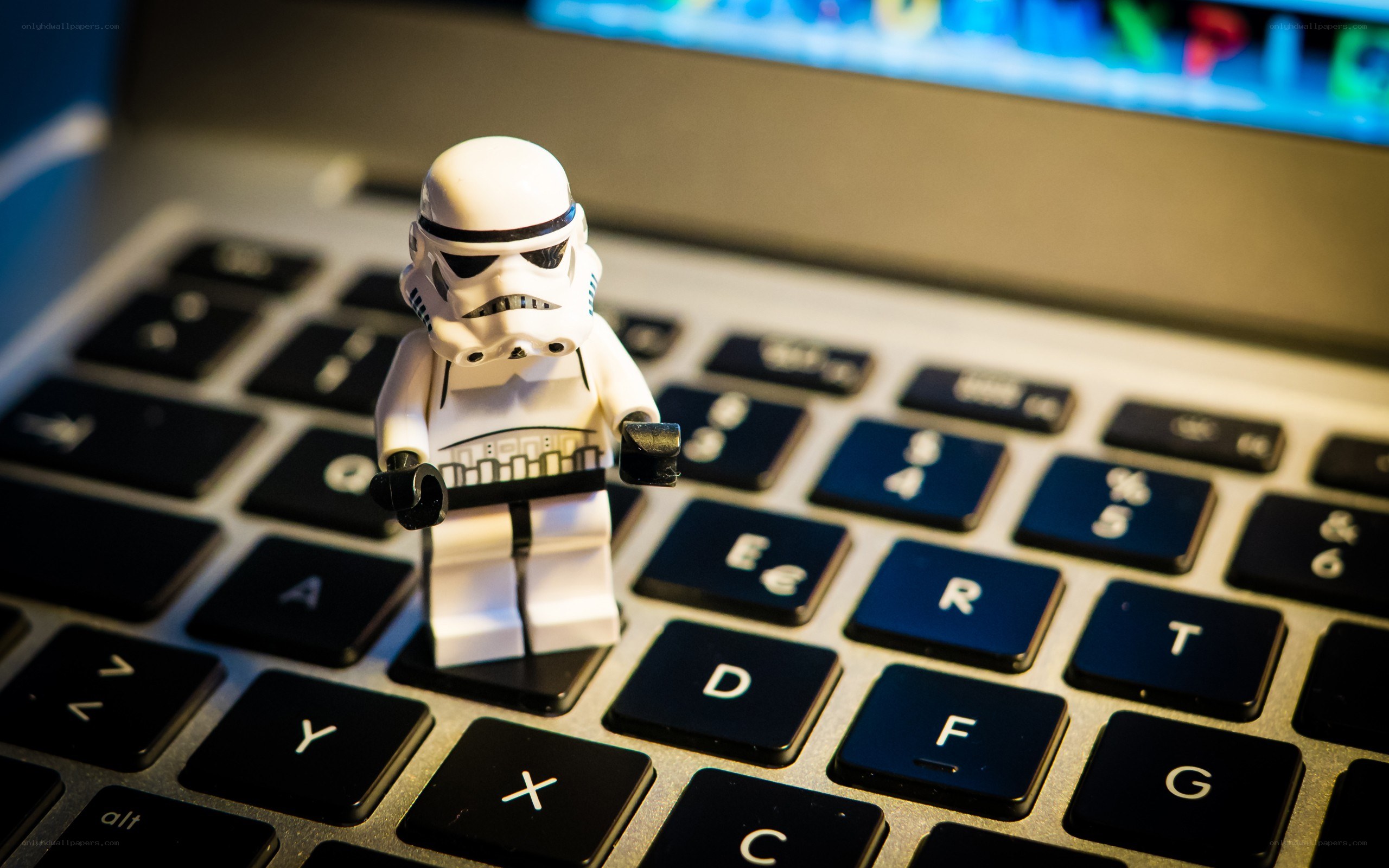 Lego stormtrooper on laptop keyboard