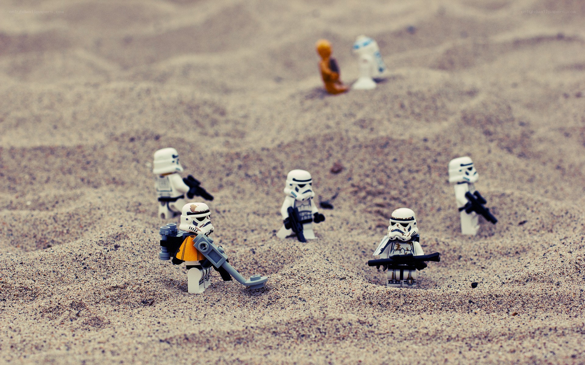 Lego stormtroopers in sand