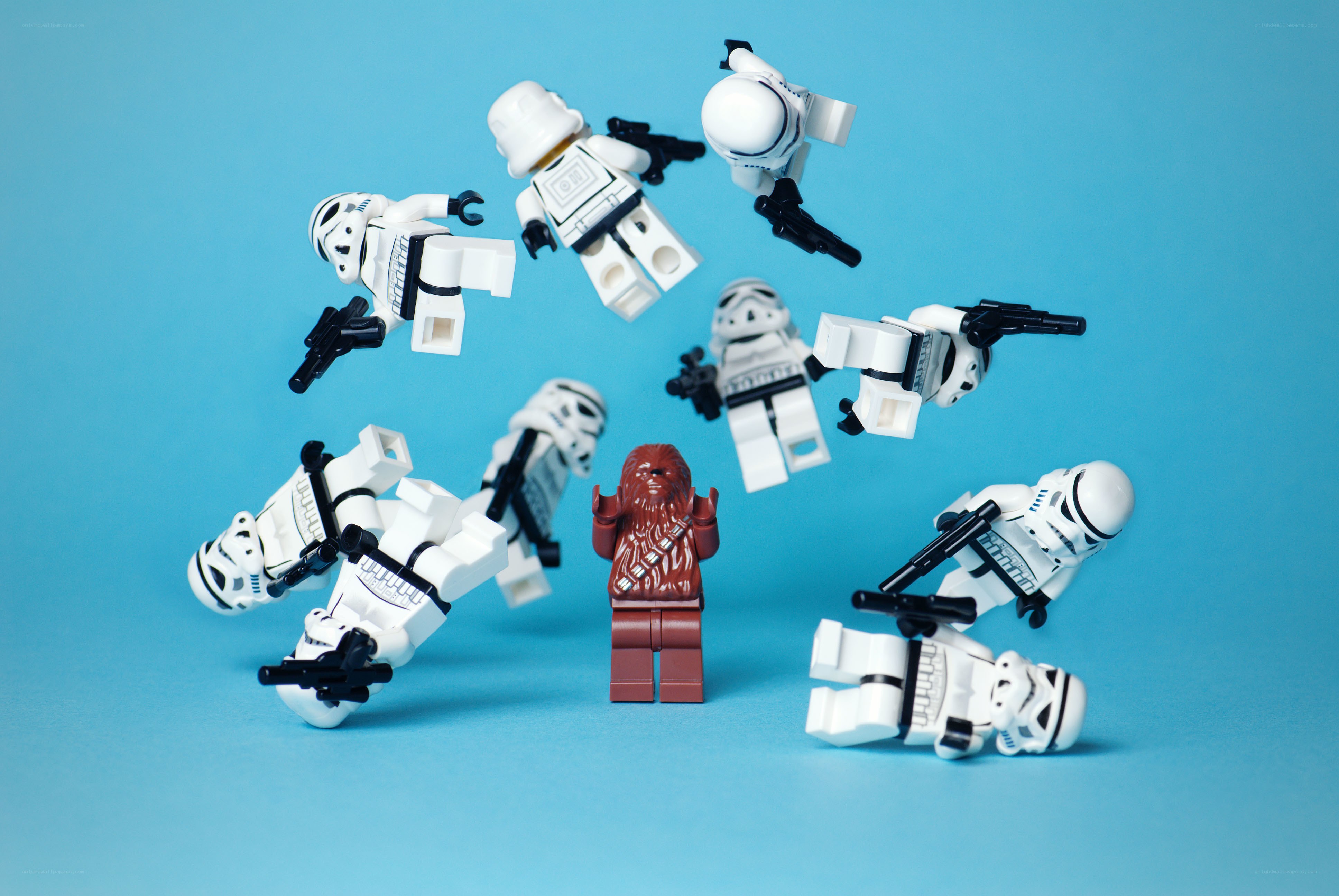 Lego stormtroopers surround Chewbacca