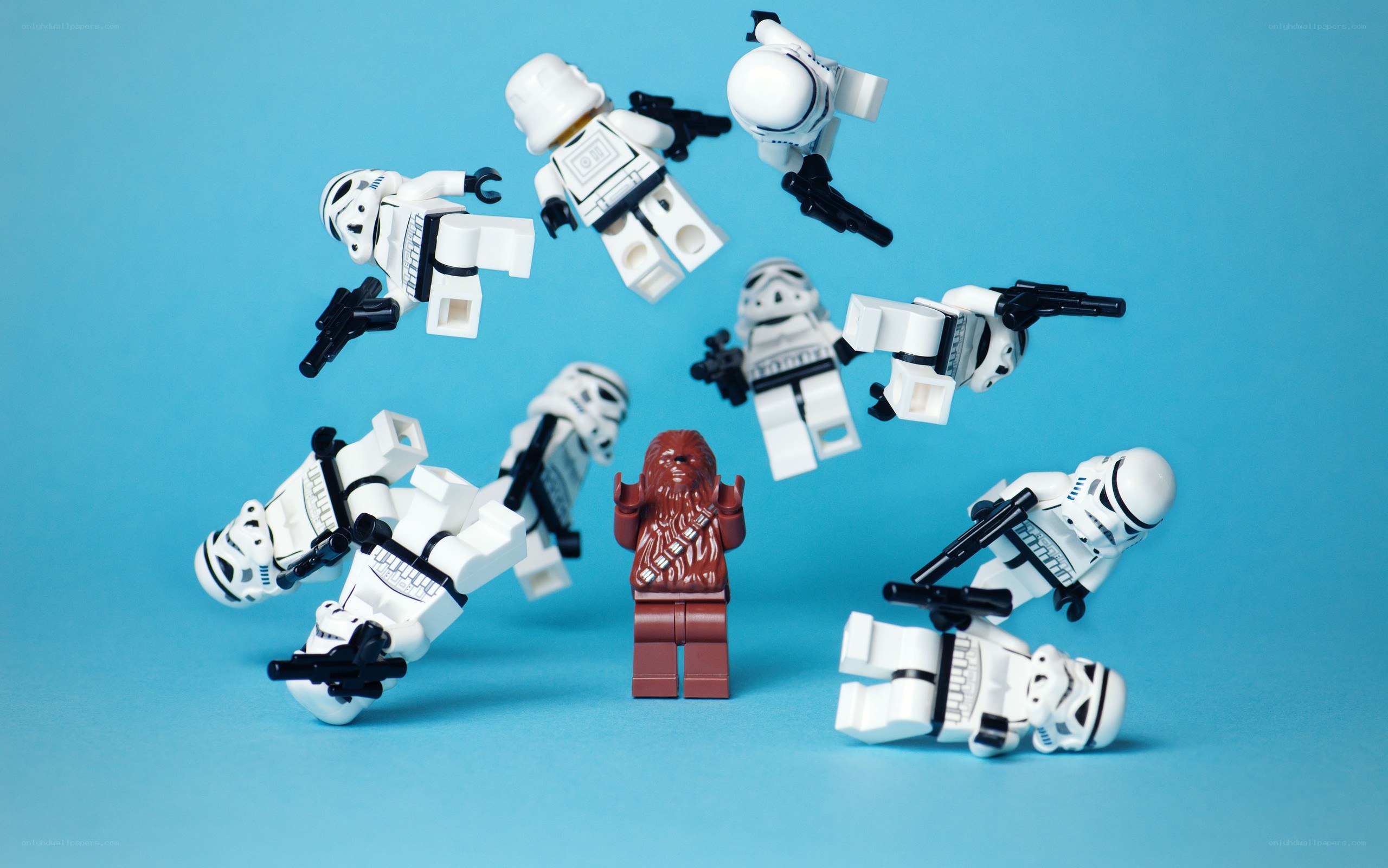 Lego stormtroopers surround Chewbacca