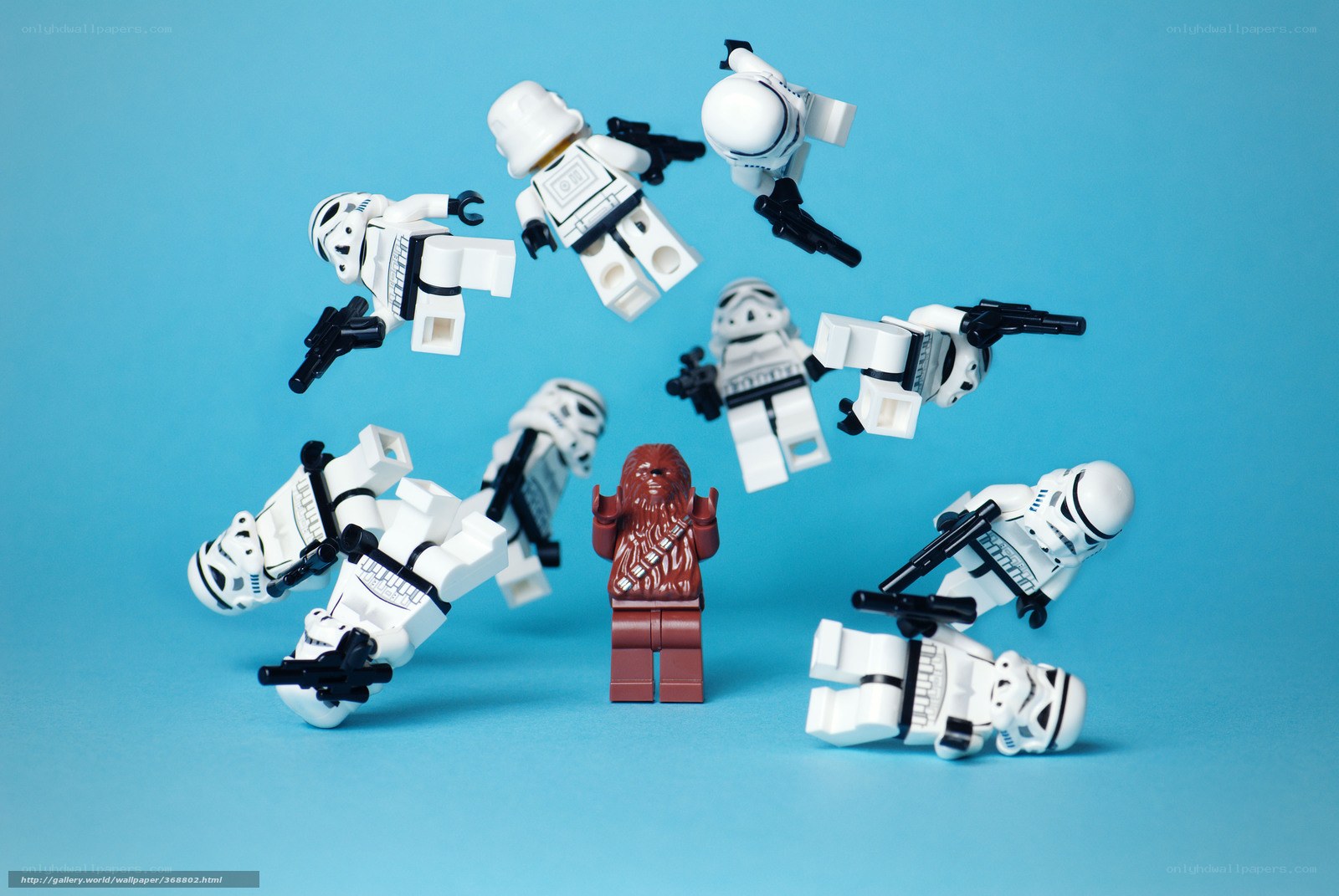 Lego stormtroopers surround Chewbacca