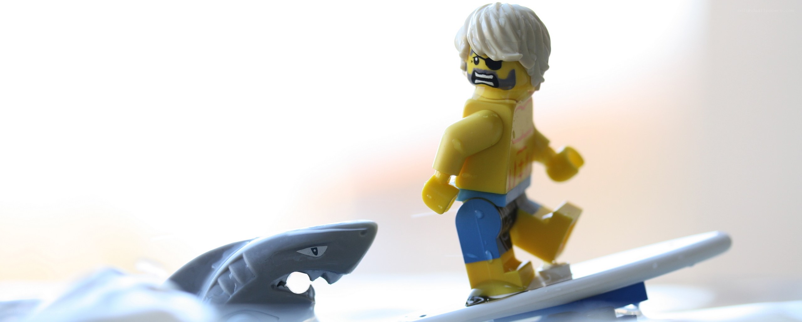 Lego surfer on surfboard