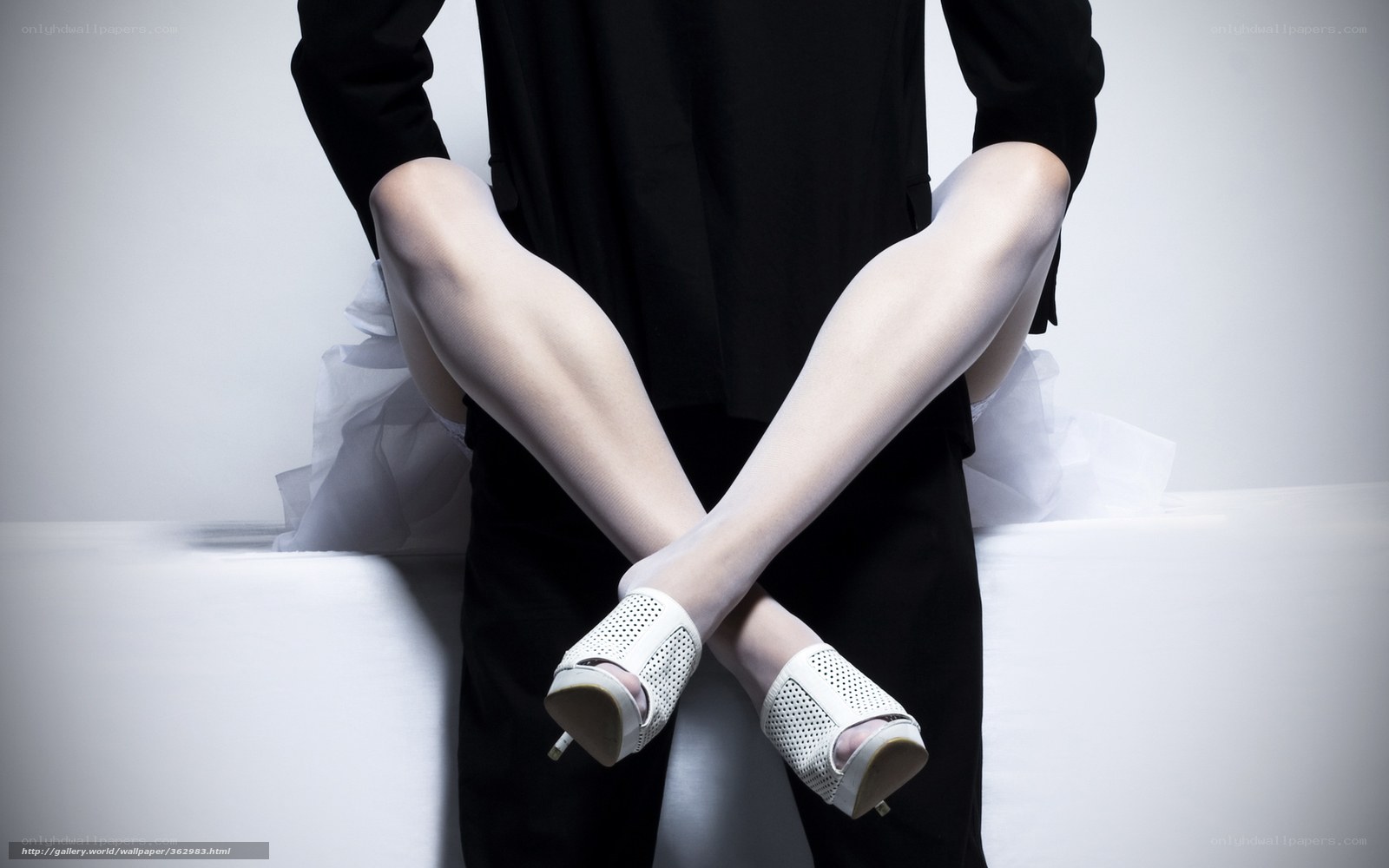 Legs crossed in high heels