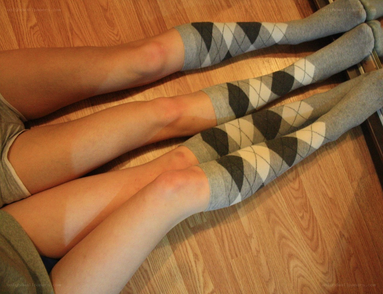 Legs in argyle socks