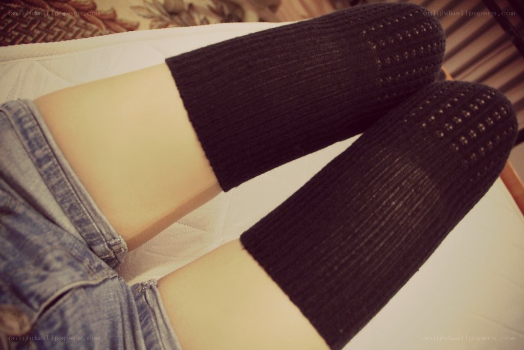 Legs in black socks