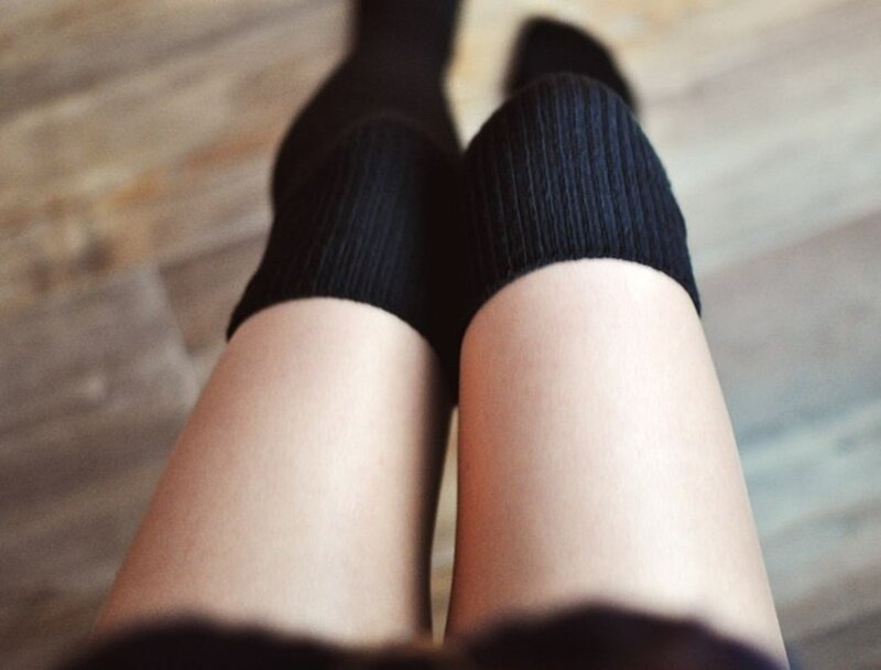legs in black socks