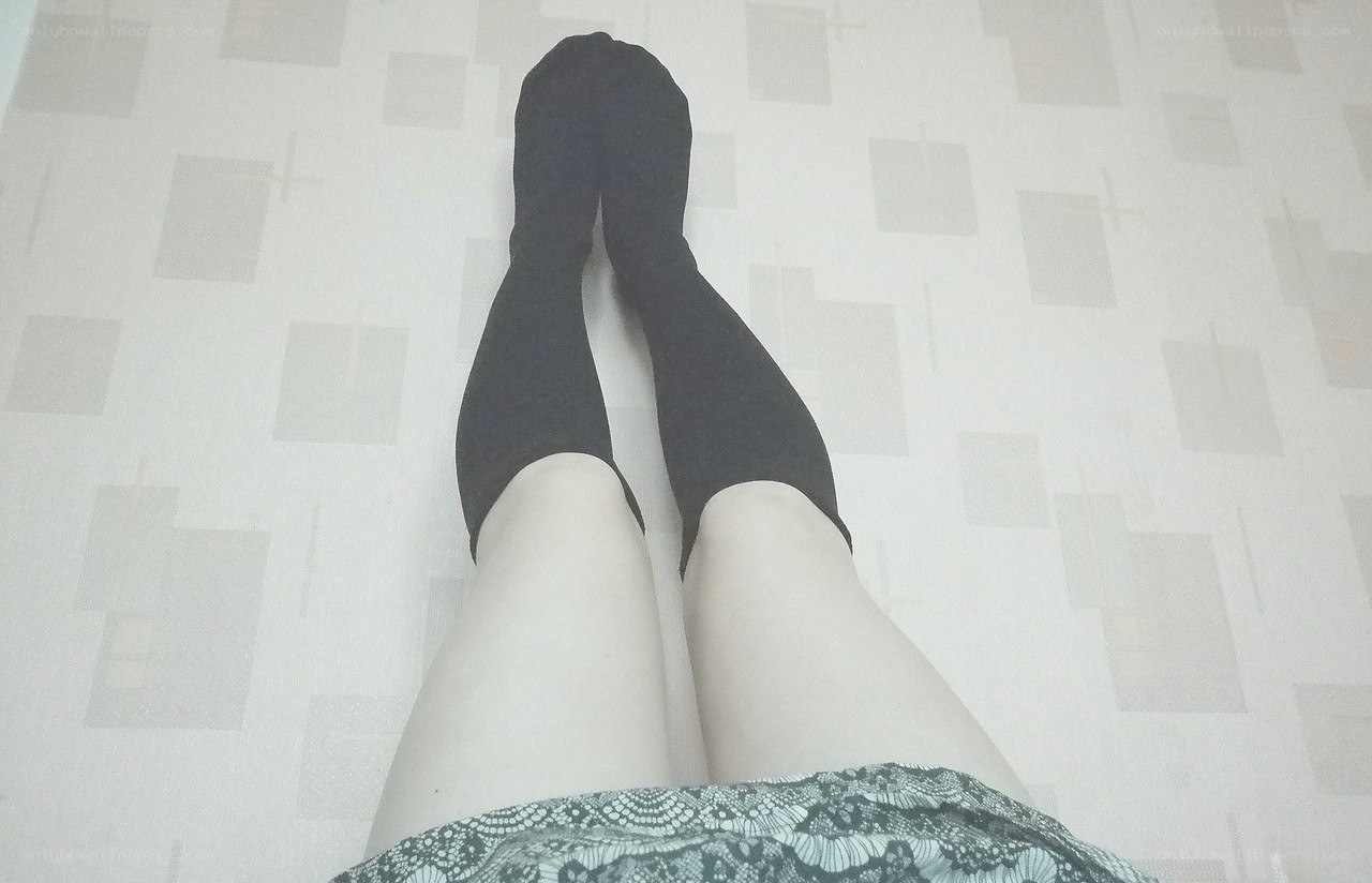 legs in black socks