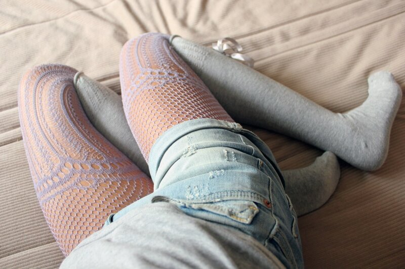 legs in different socks