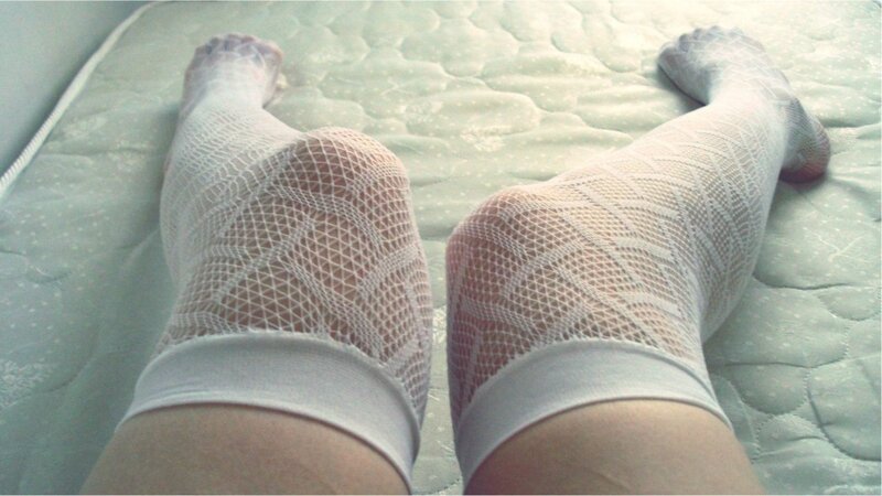 legs in fishnet stockings