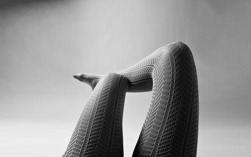 Legs in Patterned Tights — Black, Minimalist, Photograph