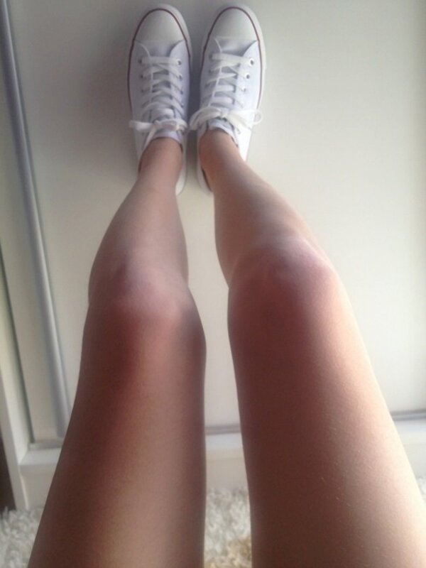 Legs in White Sneakers — Neutral