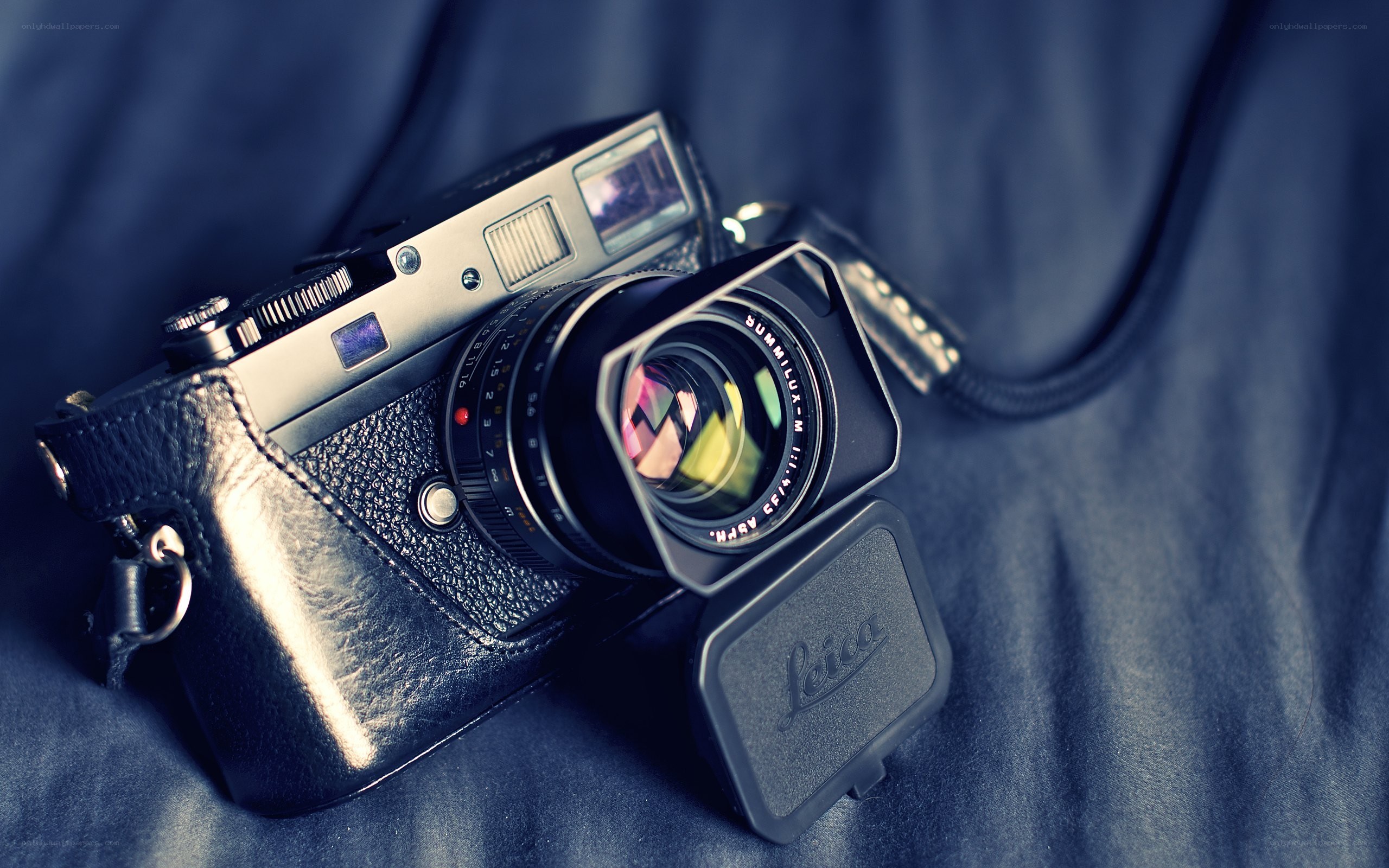 Leica camera on blue fabric